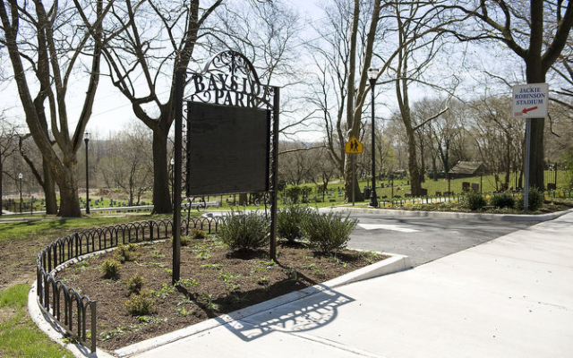 Bayside Park entrance sign with surrounding greenery and pathways, located near Jersey City, NJ, highlighting accessibility to Uforia Dispensary.