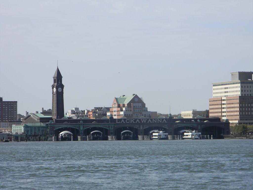 Hoboken's Lackawanna Terminal with clock tower and waterfront view, nearby Uforia Dispensary for cannabis shopping and delivery in Jersey City.