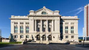 Hudson County Courthouse building in Jersey City, NJ, showcasing classical architecture and prominent entrance, located near Uforia Dispensary in Journal Square.