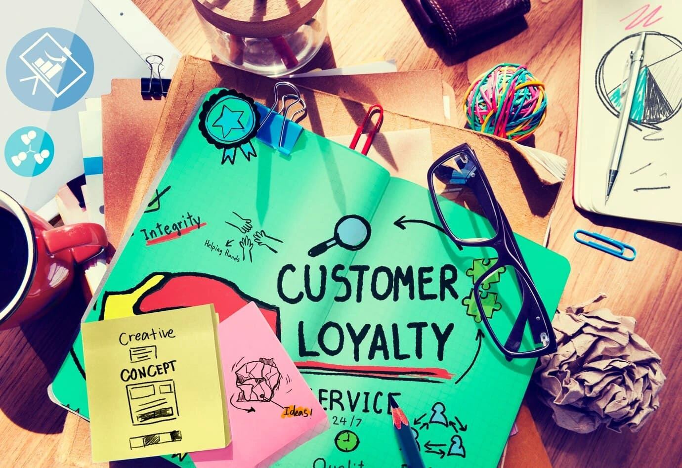 Customer loyalty concept illustrated with colorful notes, glasses, and a coffee cup, emphasizing service and satisfaction in a creative workspace.
